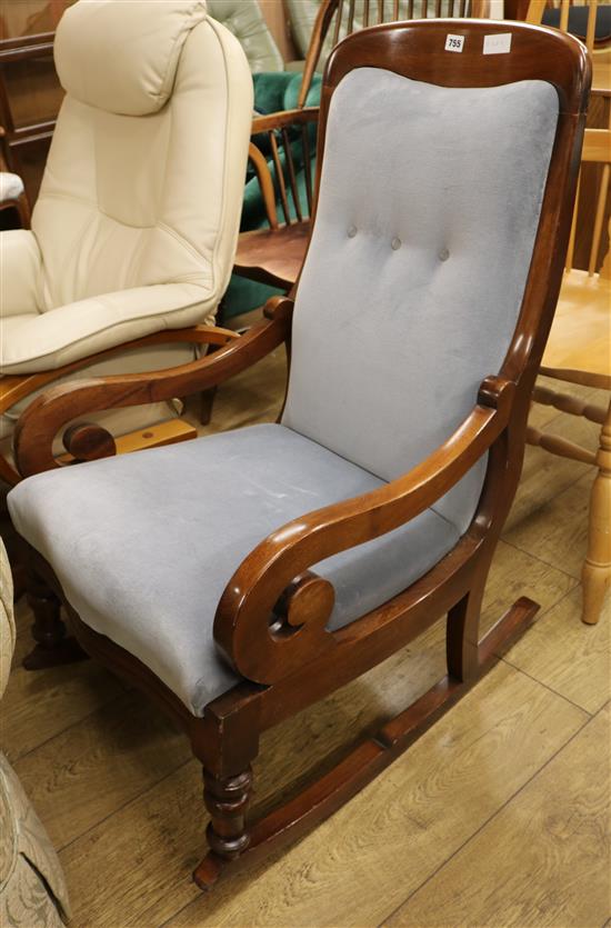 A Victorian mahogany rocking armchair